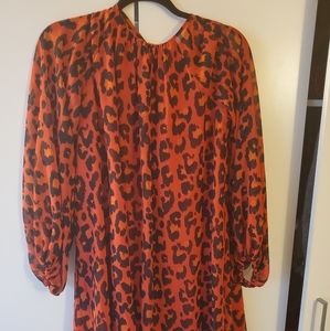Eva Mendes red animal print flowy dress